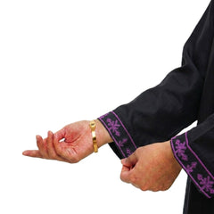 Plum Khaddar Black colour embroidered with Purple threads on 2pc stitched suit for Girls.