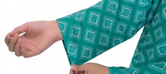 Plum Lilen (imported Fabric) Sea Green colour printed White Patters with Sea Green buttons on 2pc stitched suit for Girls.