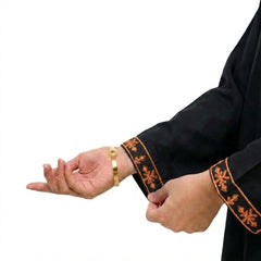 Plum Khaddar Black Colour embroidered with Rust Threads on 2pc stitched suit for Girls.