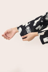 Plum Digital Lawn Black Colour Printed white Patterns On 2 pc stitched suit For Girls.