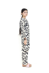 Plum Digital Lawn White & Black Colour with Black buttons On 2 Pc stitched suit for Girls.