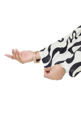 Plum Digital Lawn White & Black Colour with Black buttons On 2 Pc stitched suit for Girls.