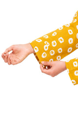 Plum Lilen (imported fabric) Yellow Colour printed White patterns with Yellow buttons on 2pc stitched suit for Girls.